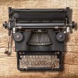 old typewriter on wood background